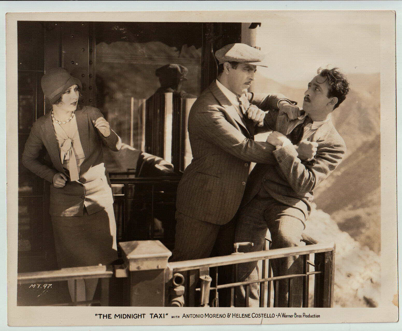 Helene Costello and Antonio Moreno in The Midnight Taxi (1928)