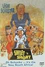 Casper de Vries, Alfred Ntombela, Leon Schuster, and Joanna Weinberg in Sweet 'n Short (1991)