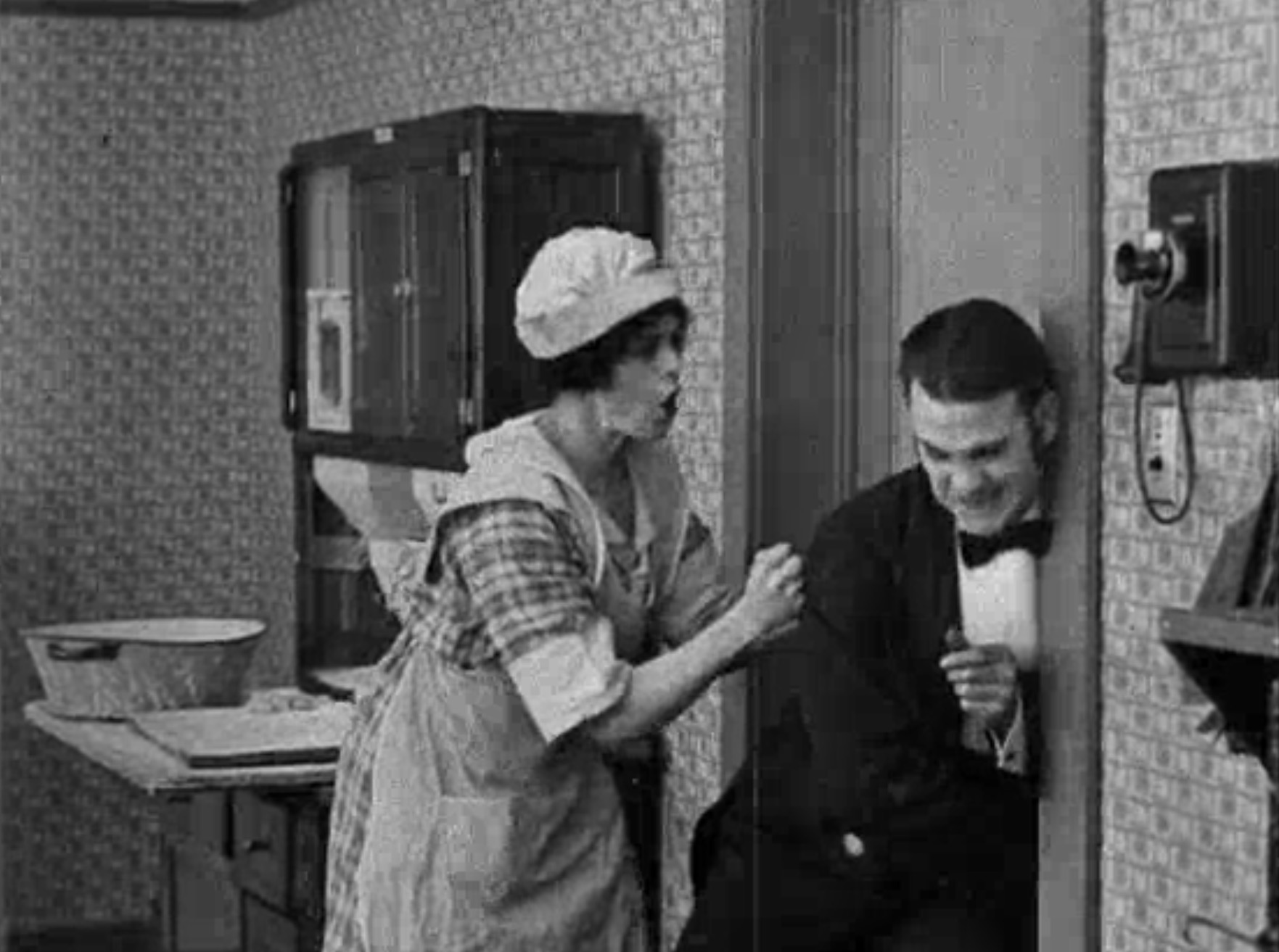 Dot Farley and Otto Fries in The Paperhangers' Revenge (1918)