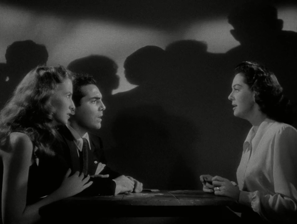 Richard Benedict, Betsy Blair, and Rosalind Russell in The Guilt of Janet Ames (1947)