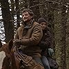 Pedro Pascal and Bella Ramsey in Kin (2023)