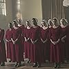 Elisabeth Moss, Nina Kiri, Madeline Brewer, Ashleigh LaThrop, and Bahia Watson in The Handmaid's Tale (2017)