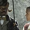 David Gyasi and Tamzin Merchant in Carnival Row (2019)