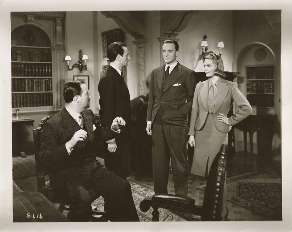 George Sanders, Sally Gray, Carl Jaffe, and Ralph Truman in The Saint in London (1939)