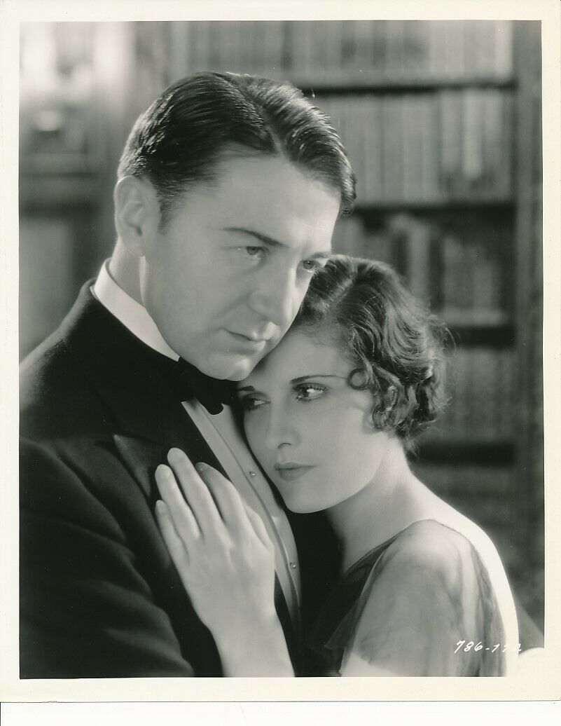 Evelyn Brent and Clive Brook in Slightly Scarlet (1930)