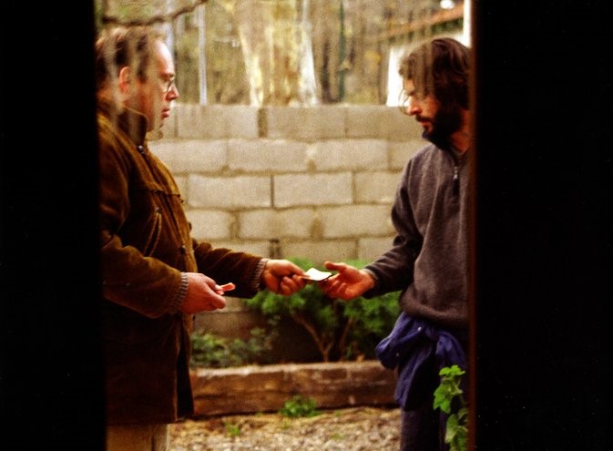 Olivier Gourmet and Eduardo Noriega in Les mans buides (2003)