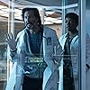 Caroline Chikezie and Henry Ian Cusick in The Passage (2019)