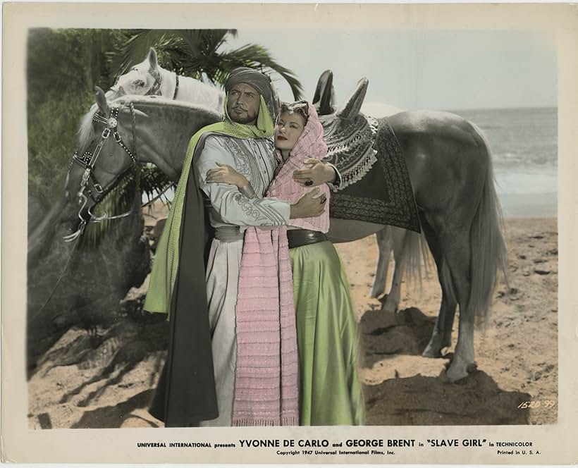 Yvonne De Carlo and Albert Dekker in Slave Girl (1947)