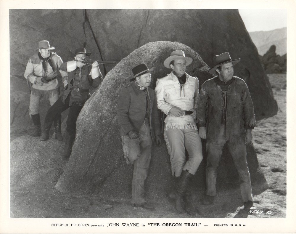 John Wayne, E.H. Calvert, Harry Harvey, Frank Rice, and Jack Rutherford in The Oregon Trail (1936)