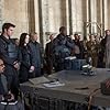 Woody Harrelson, Jeffrey Wright, Mahershala Ali, Jennifer Lawrence, Desmond Phillips, Liam Hemsworth, and Gwendoline Christie in The Hunger Games: Mockingjay - Part 2 (2015)