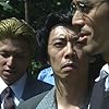 Hiroshi Abe, Kazuki Maehara, and Katsuhisa Namase in Trick (2000)