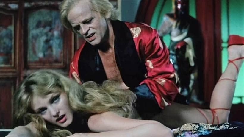 Klaus Kinski and Arielle Dombasle in Fruits of Passion (1981)