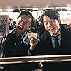 Tadanobu Asano and Ryunosuke Kamiki in Keiji Yugami (2017)