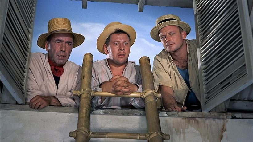 Humphrey Bogart, Peter Ustinov, and Aldo Ray in We're No Angels (1955)