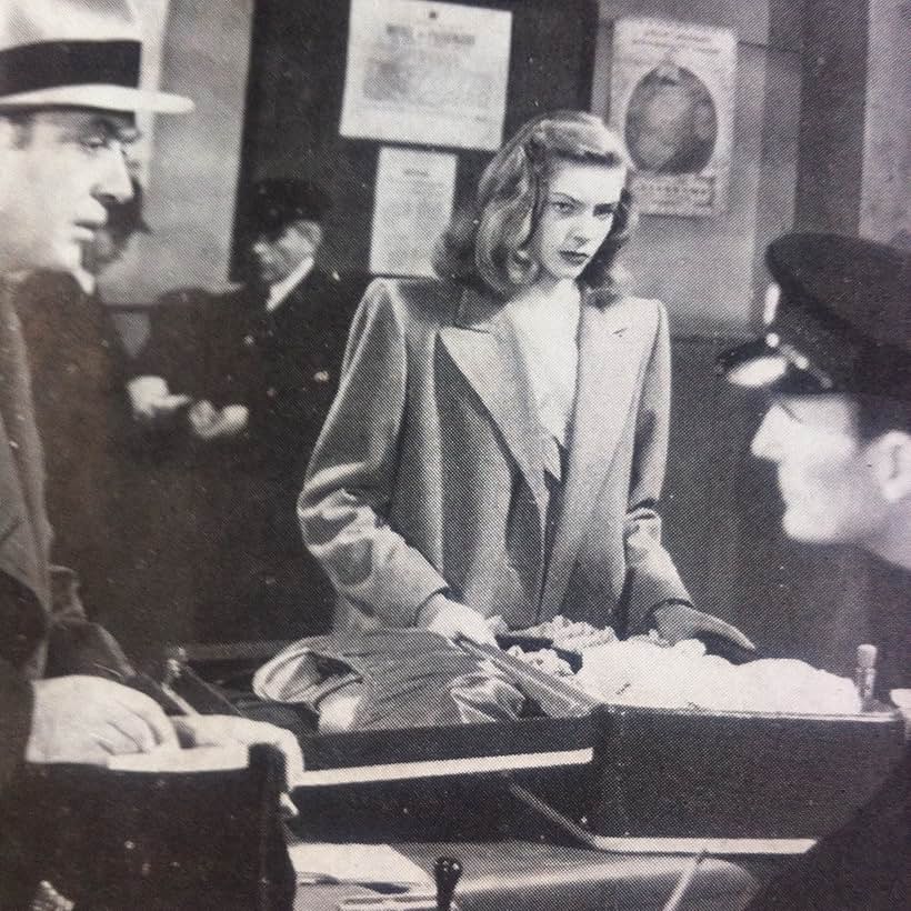 Lauren Bacall, Charles Boyer, and Charles Knight in Confidential Agent (1945)