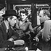 Ray Milland, Howard Da Silva, and Doris Dowling in The Lost Weekend (1945)