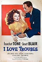 Janet Blair and Franchot Tone in I Love Trouble (1948)