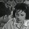 Derren Nesbitt and Margaret Whiting in The Informers (1963)