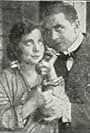 Jane Gail and Matt Moore in The Brass Girl (1917)