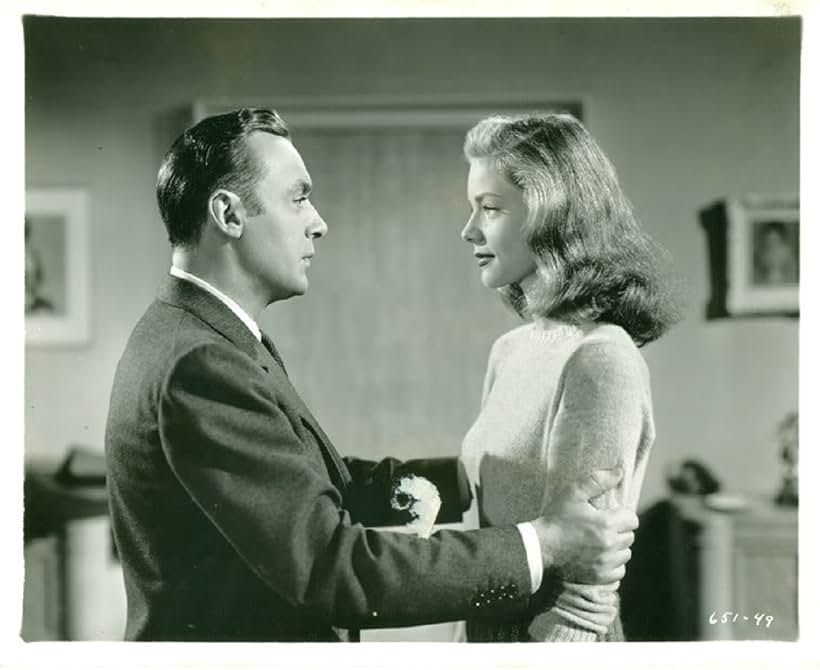 Lauren Bacall and Charles Boyer in Confidential Agent (1945)