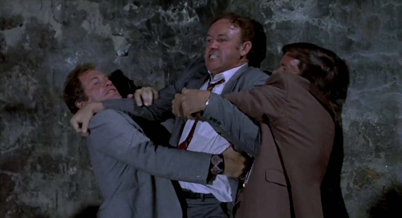 Gene Hackman, Jean-Pierre Castaldi, and Bernard Fresson in French Connection II (1975)