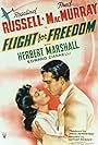 Fred MacMurray and Rosalind Russell in Flight for Freedom (1943)