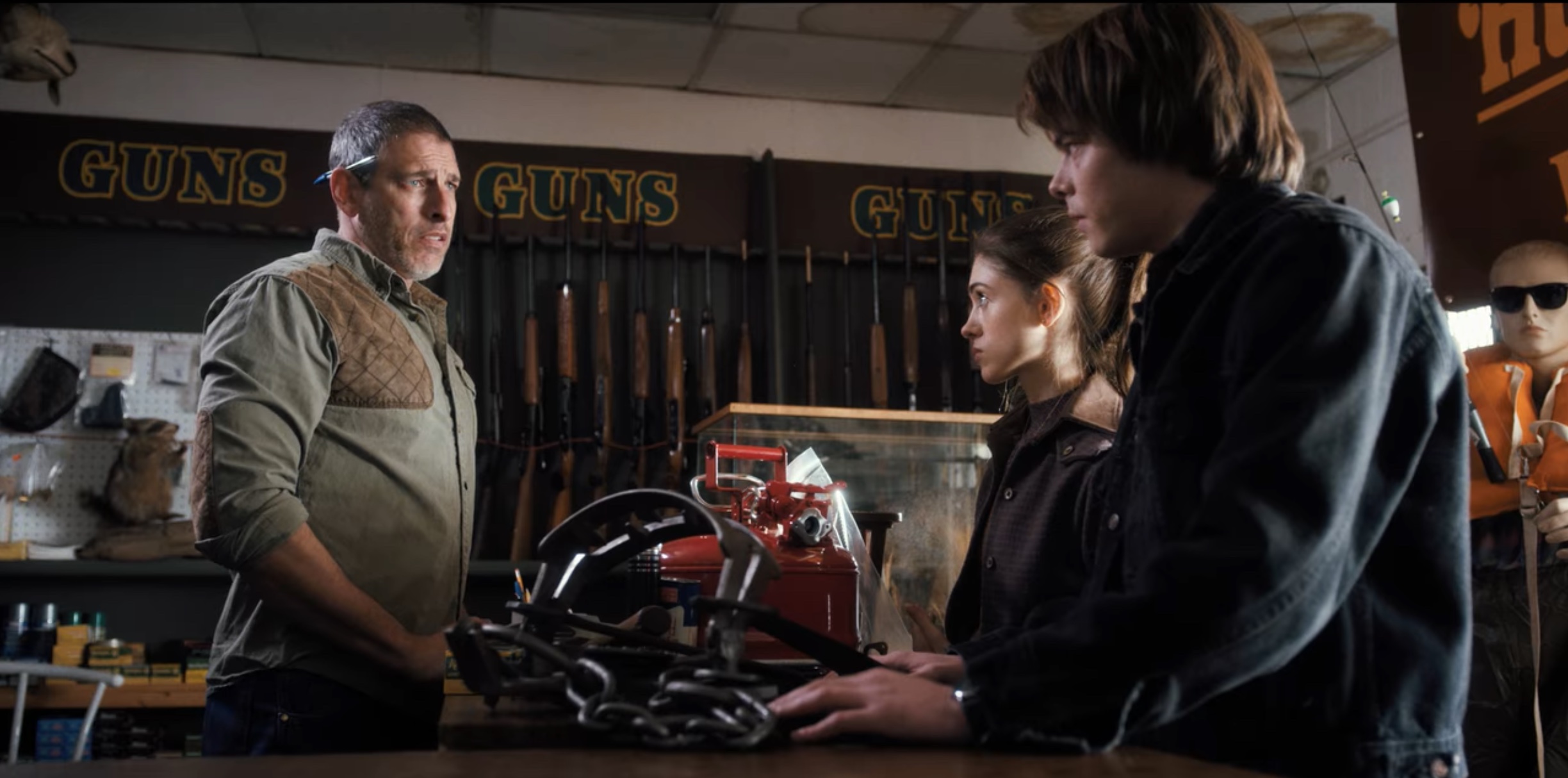 Adam Boyer, Natalia Dyer, and Charlie Heaton in Stranger Things (2016)