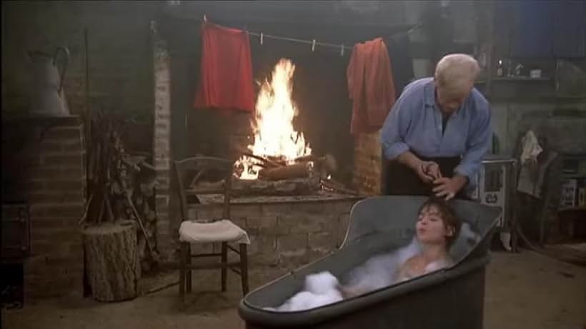 Klaus Kinski and Pénélope Palmer in La femme enfant (1980)