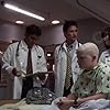 George Clooney, Noah Wyle, Vanessa Marquez, Pat Millicano, and Jason Barnhill in ER (1994)