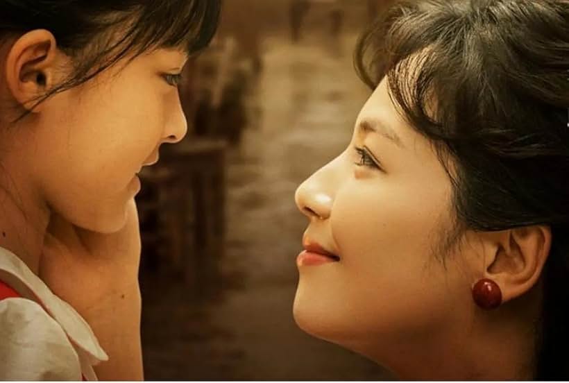 Yujie Fan and Tao Liu in My People, My Country (2019)