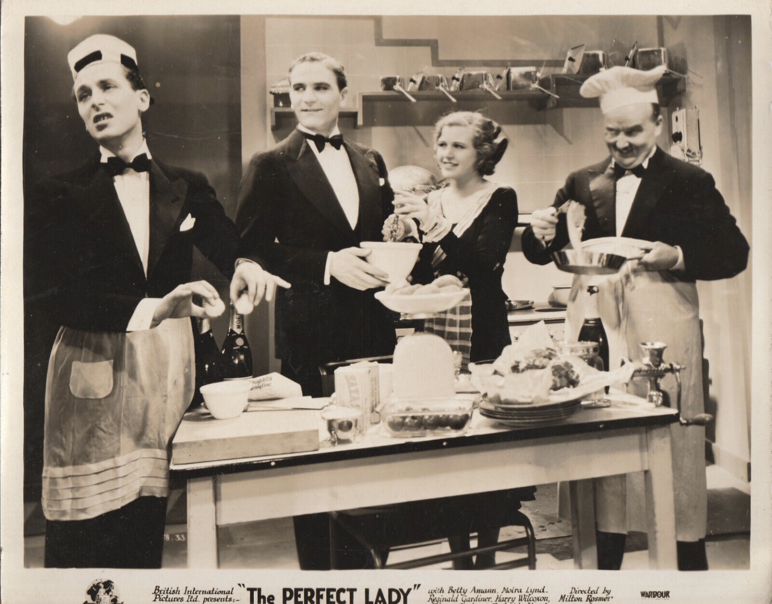 Reginald Gardiner, Frederick Lloyd, Moira Lynd, and Henry Wilcoxon in The Perfect Lady (1931)