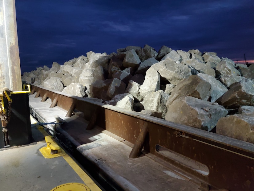 Grey stone on a metal barge