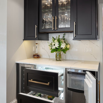 Mini fridge drawers and ice maker in bar