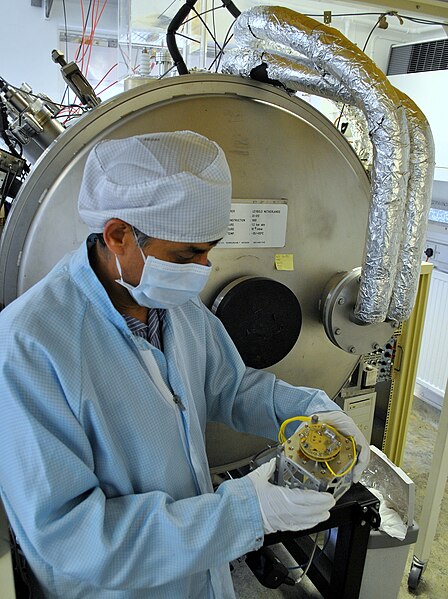 File:Scientist holding a CubeSat.jpg