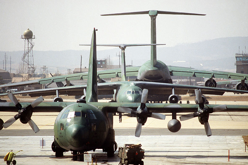 File:A C-130 Hercules, C-141B Starlifter and a C-5 Galaxy aircraft are parked on the Military Airlift Command flight line during Exercise Team Spirit '86 DF-ST-87-09684.jpg