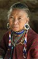 Woman with streched ear lobes, Thailand