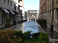 Trajan Street with the Arch on the background