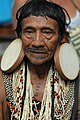 Rikbaktsa man with streched ear lobes, Brazil