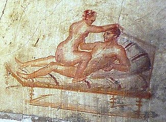 an erotic wall painting in Pompeii