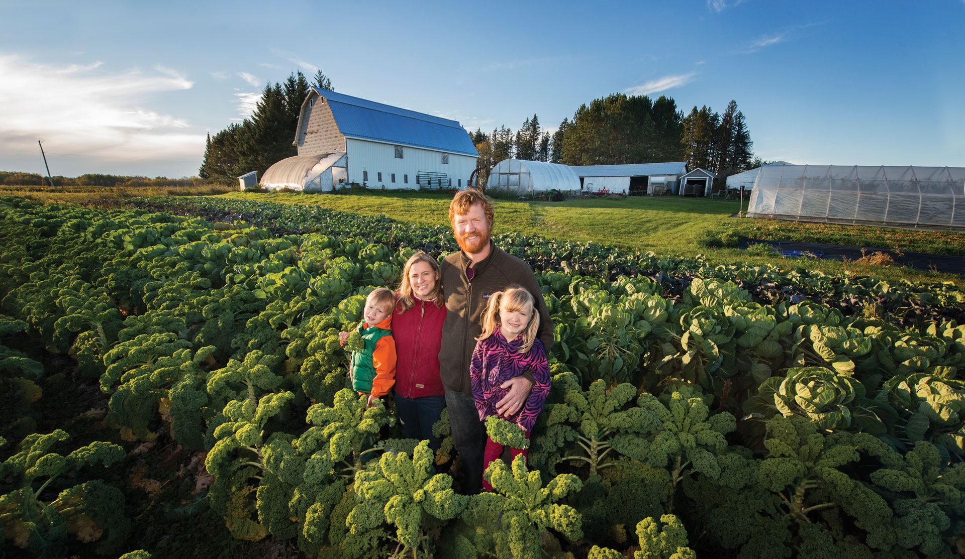 A family standing in a field