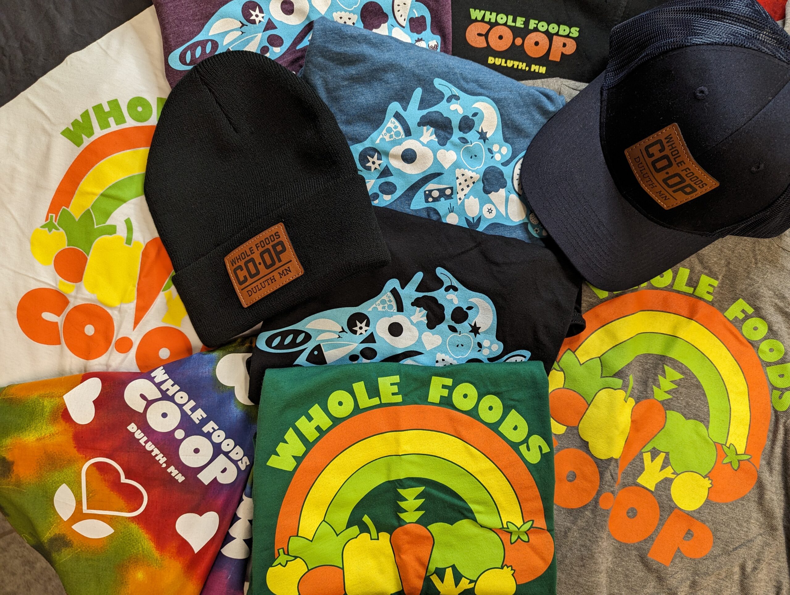 hats and t-shirts in a table