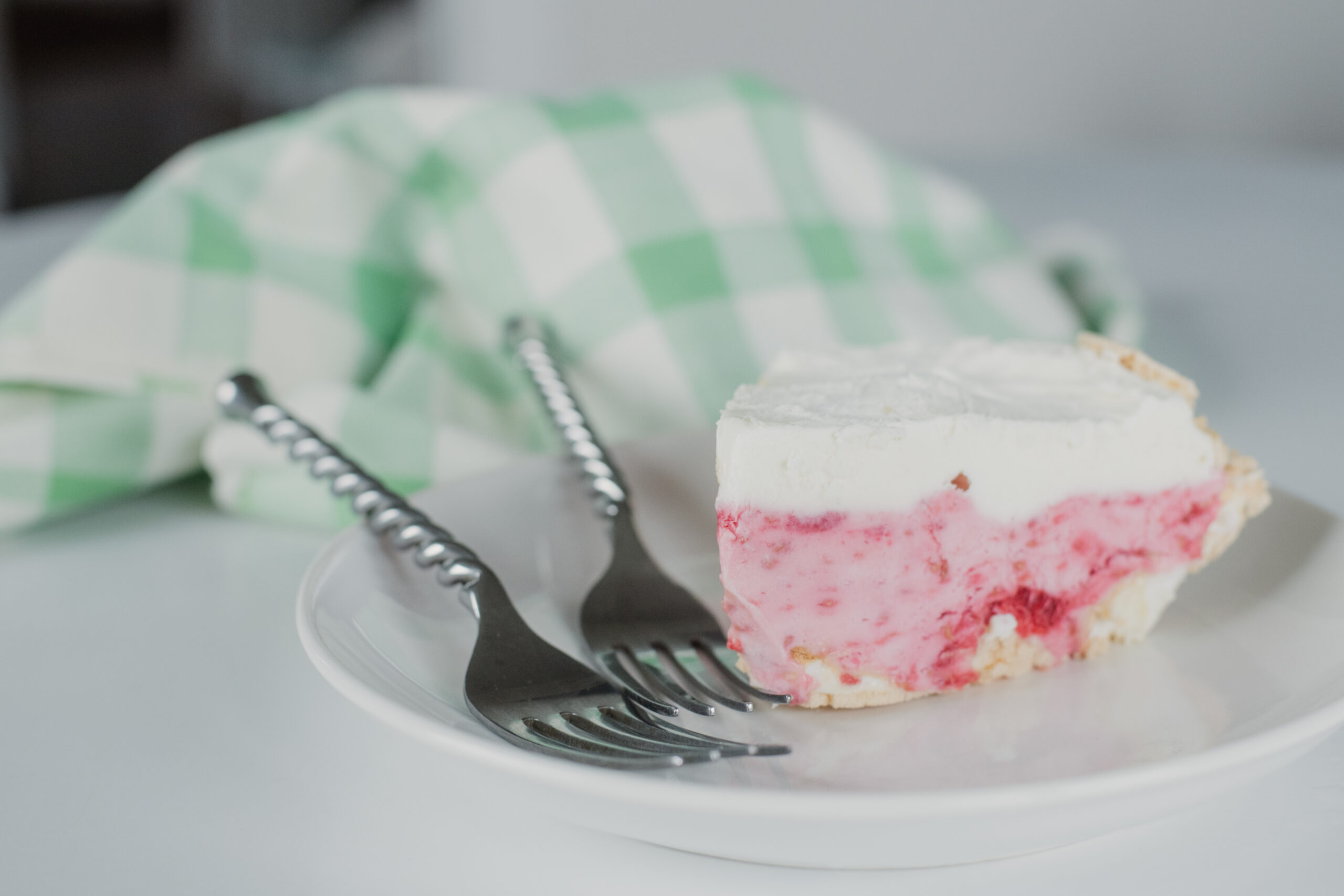 pie on a plate with forks