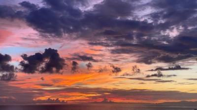 Sunset over the sea with clouds