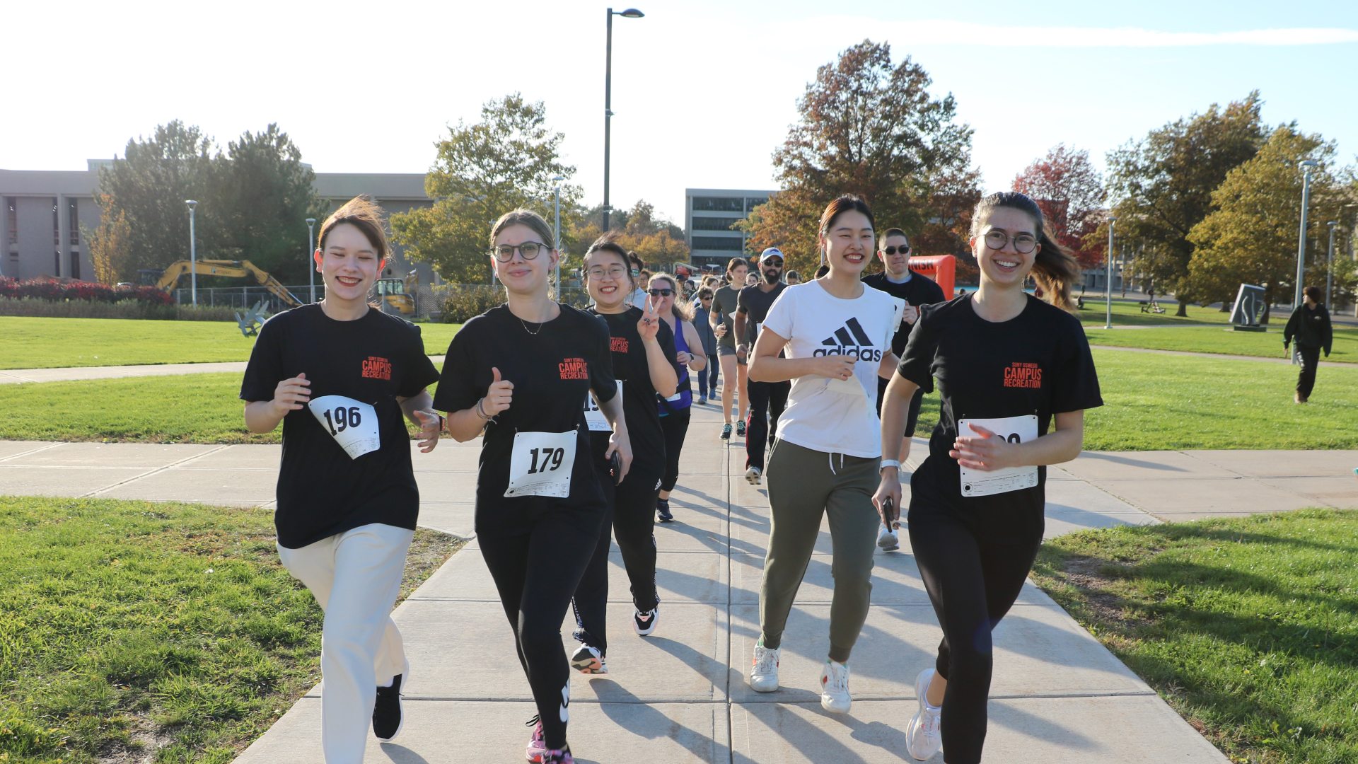 a group of students running a race