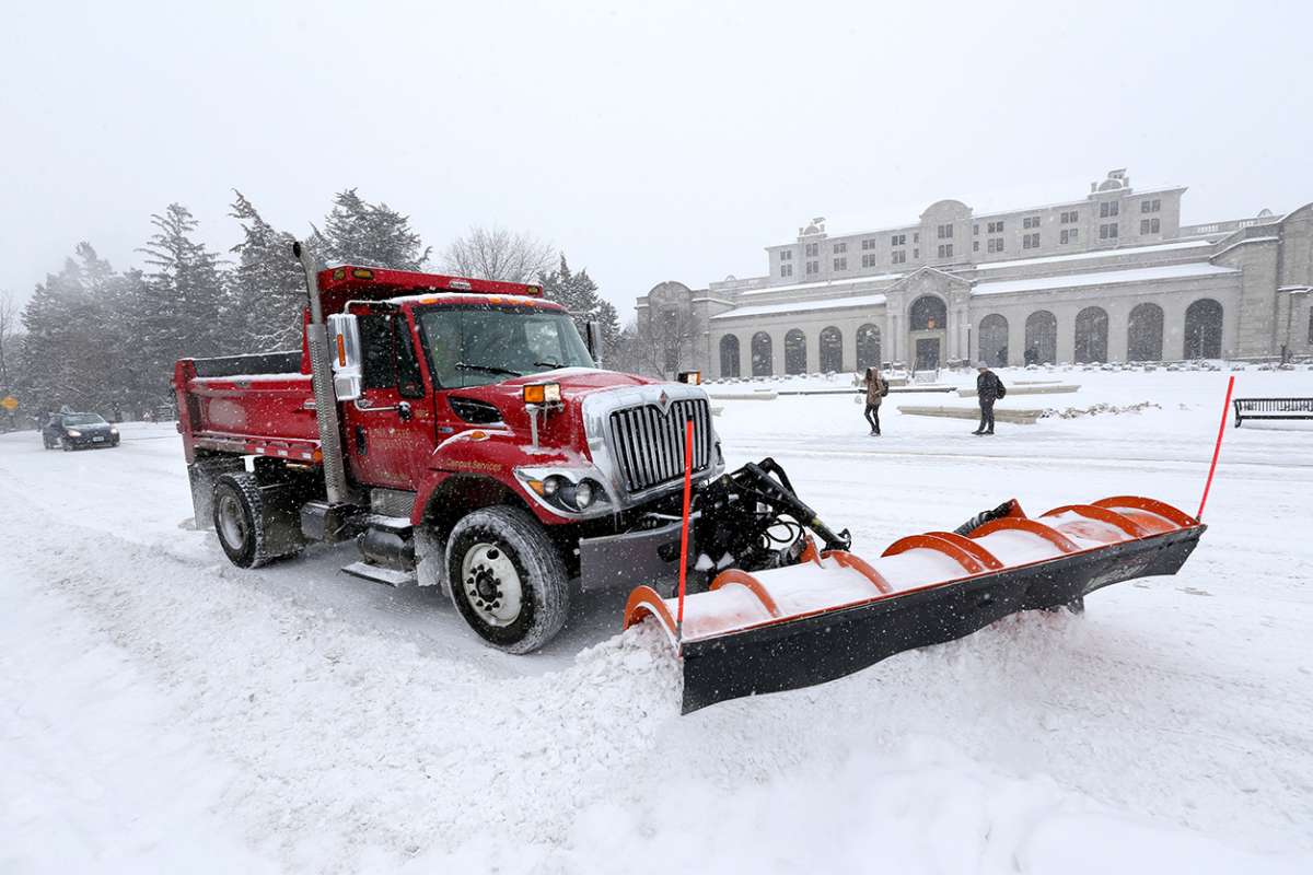 Snowplow clearing Union Drive during a snowstorm.