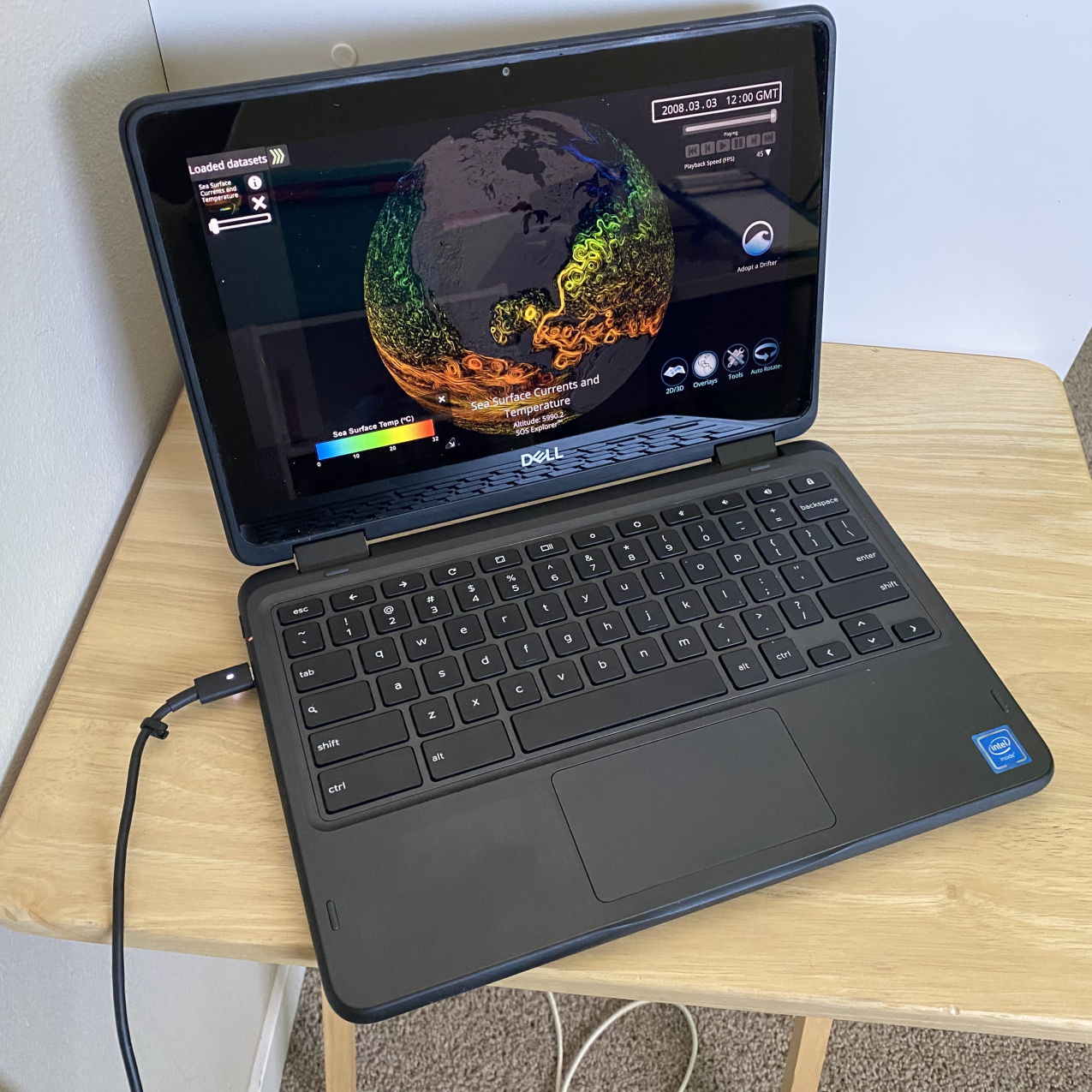 SOS Explorer displays Sea Surface Currents and Temperature dataset on a Dell Chromebook that is placed on a desk.