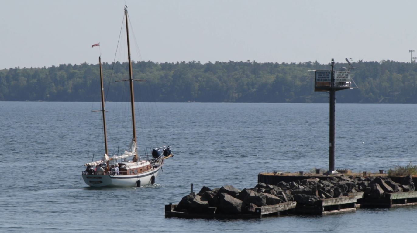 A sailboat leaves the Bayfield harbor